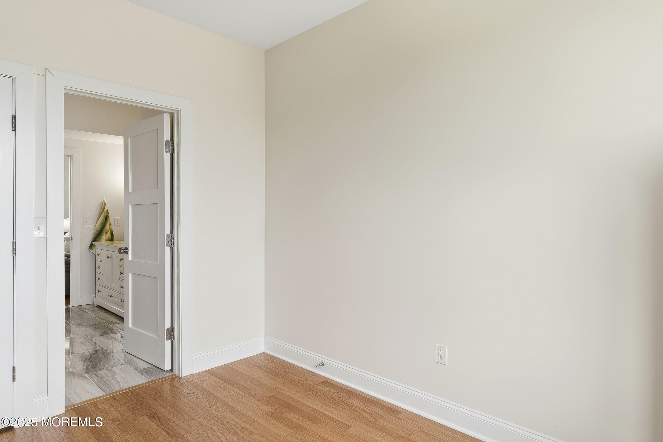 7 East Lavenia Avenue Beach Haven, NJ 08008 - Photo 29 of 48 a view of a hallway with a wooden floor