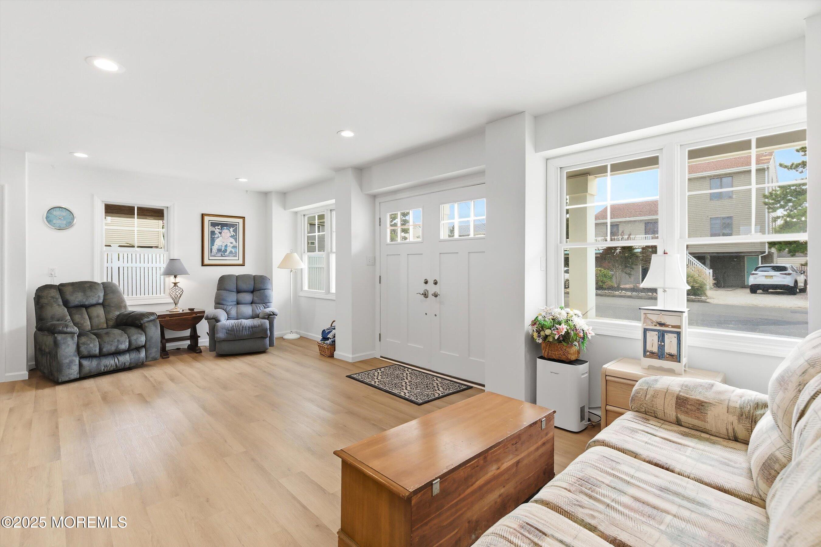 7 East Lavenia Avenue Beach Haven, NJ 08008 - Photo 3 of 48 a living room with furniture and large window