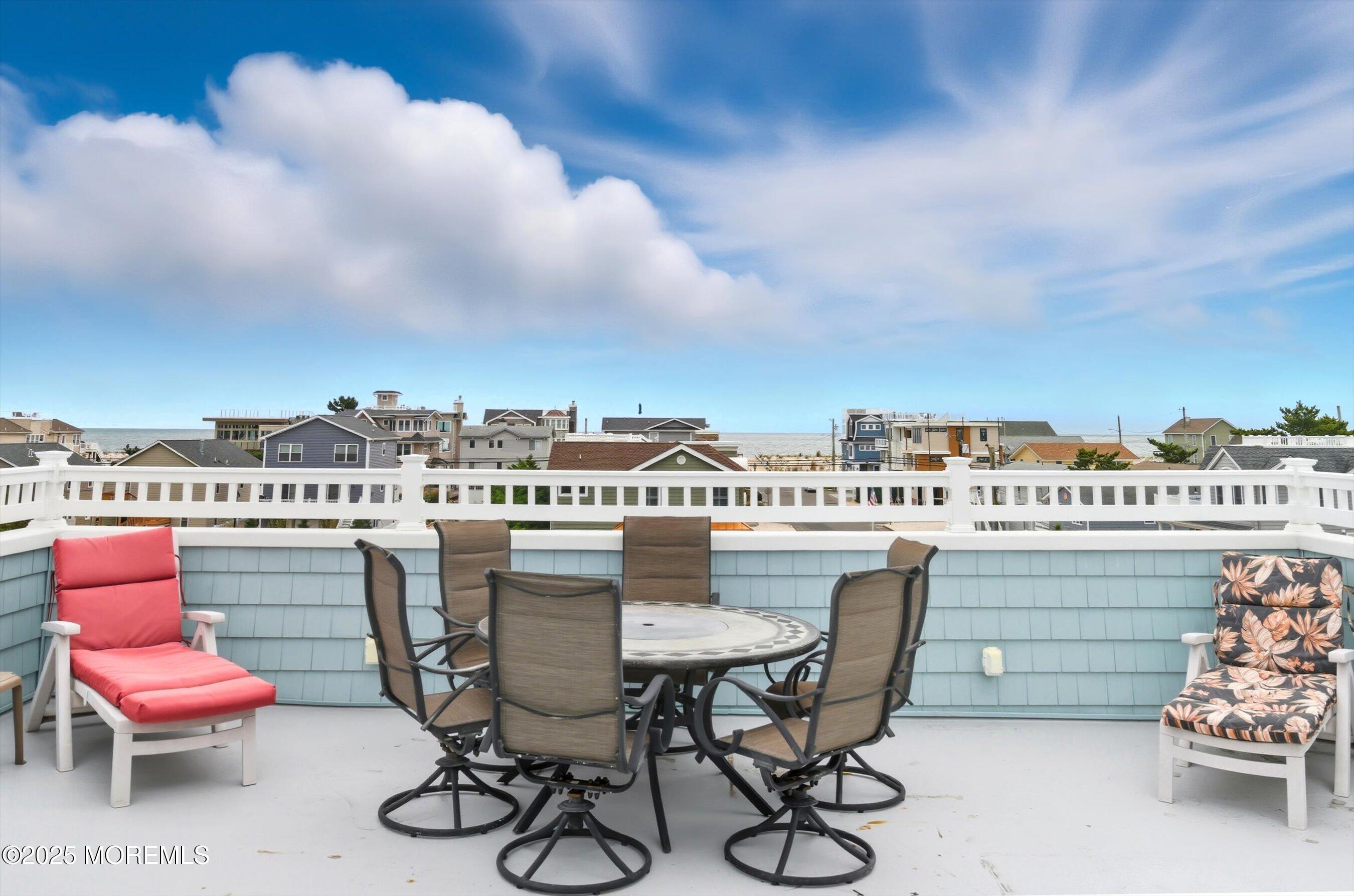 7 East Lavenia Avenue Beach Haven, NJ 08008 - Photo 33 of 48 a view of a terrace with furniture and stove