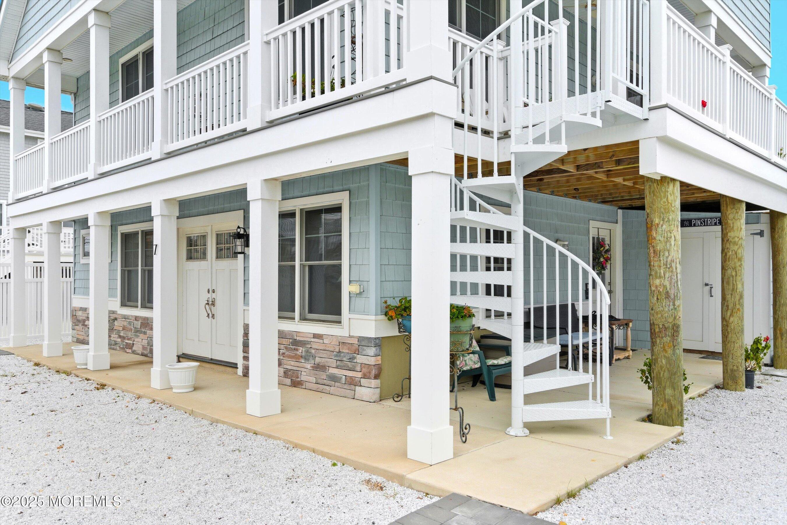 7 East Lavenia Avenue Beach Haven, NJ 08008 - Photo 37 of 48 a front view of a building with a outdoor space