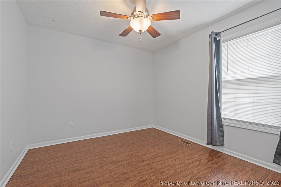 115 Shelby Street Spring Lake, NC 28390 - Photo 28 of 40 wooden floor in an empty room