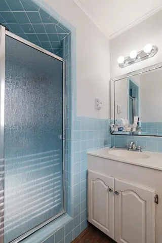 a bathroom with a sink and a mirror