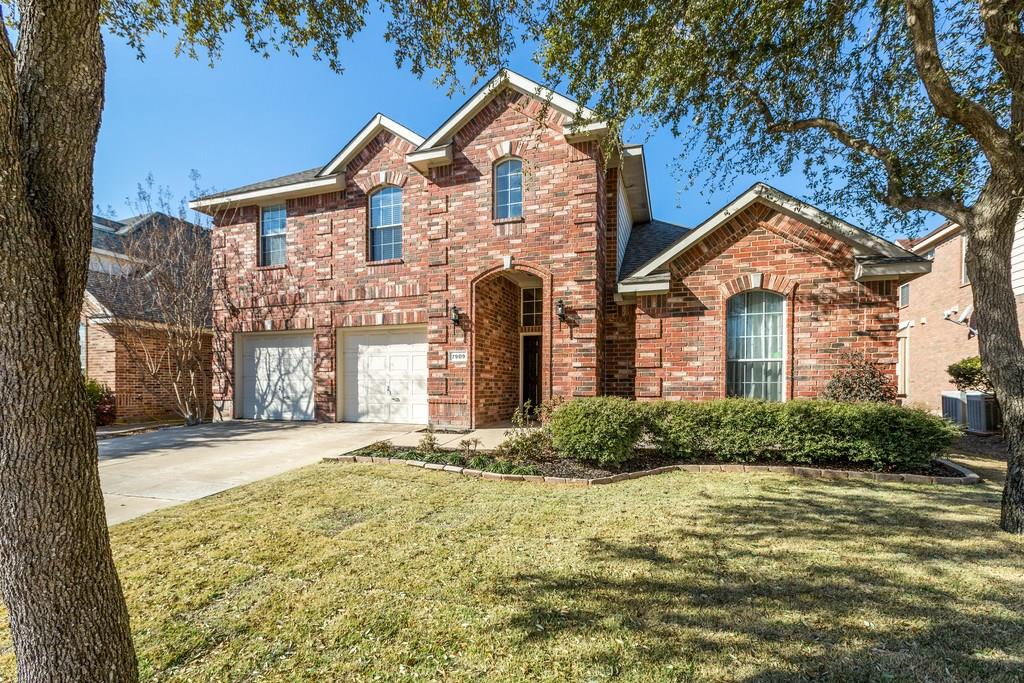 7909 Stonehaven Lane Rowlett, TX 75089 - Photo 1 of 1 a front view of a house with a yard