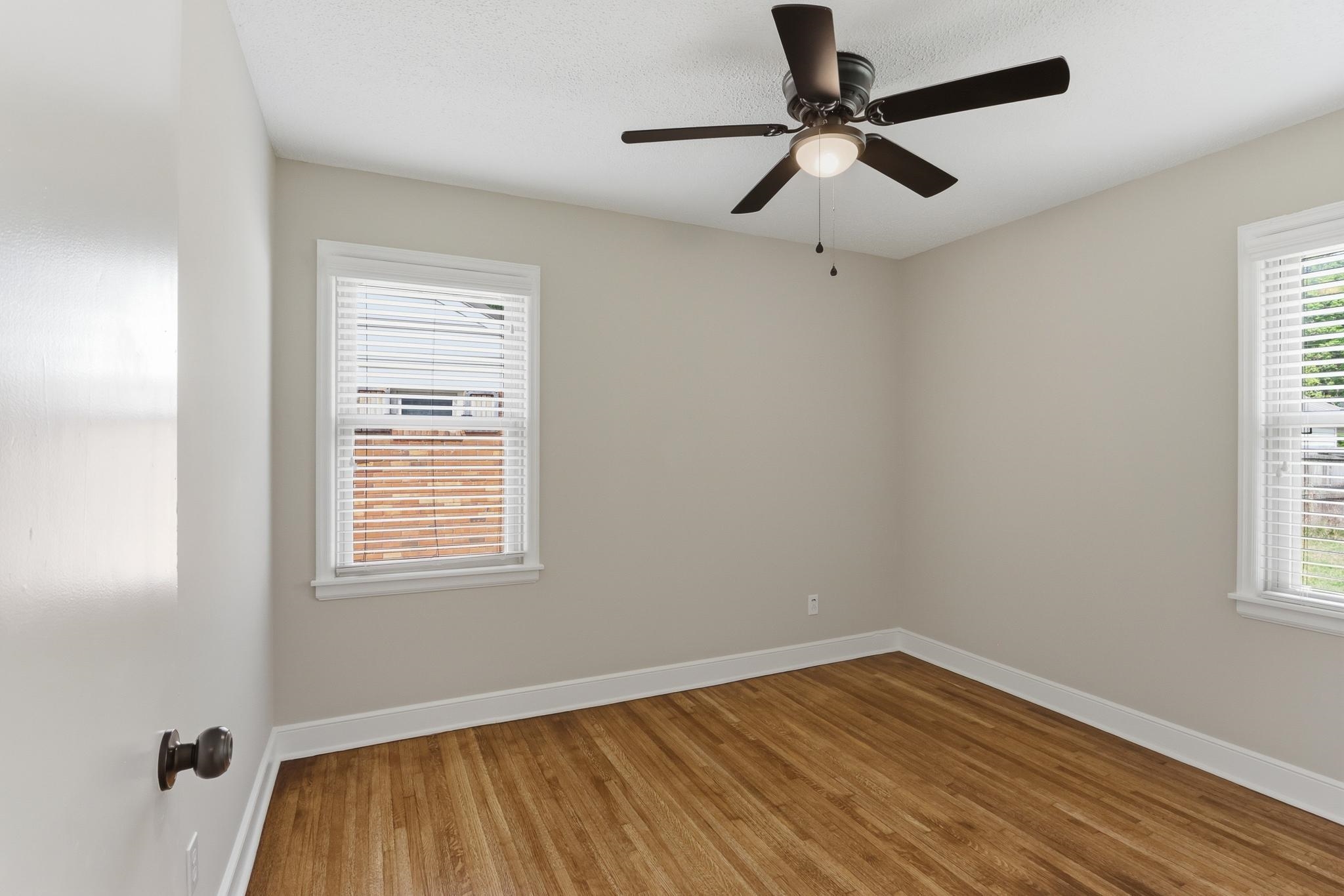 312 Fernway Road Memphis, TN 38117 - Photo 26 of 38 Unfurnished room featuring light wood-type flooring and ceiling fan