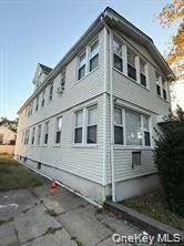 a front view of a house with garage