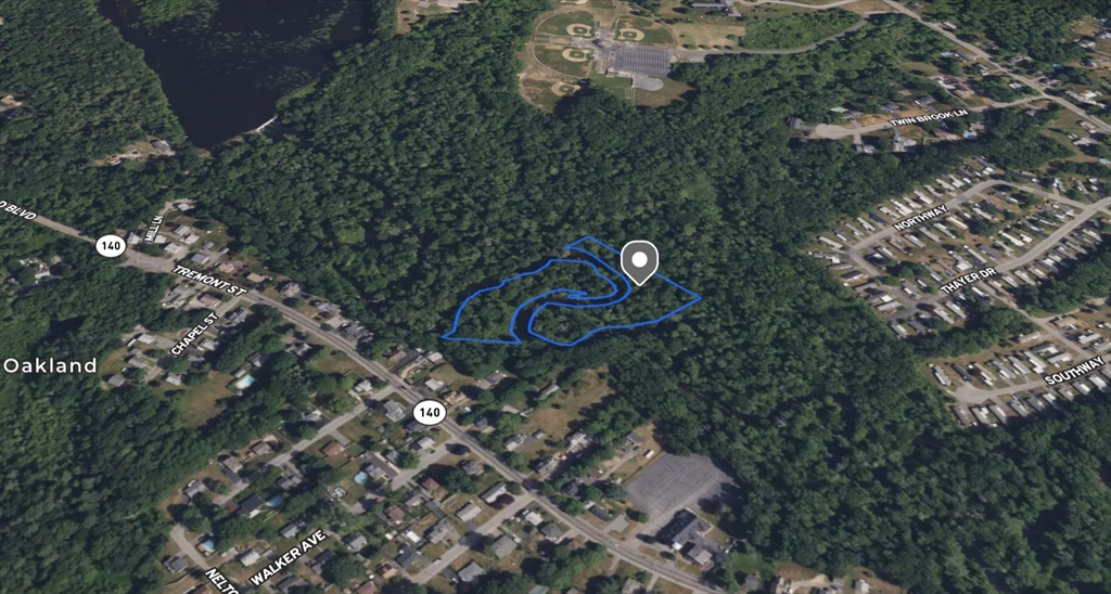 0 Norton Avenue Taunton, MA 02780 - Photo 6 of 7 an aerial view of a house with a yard and parking space