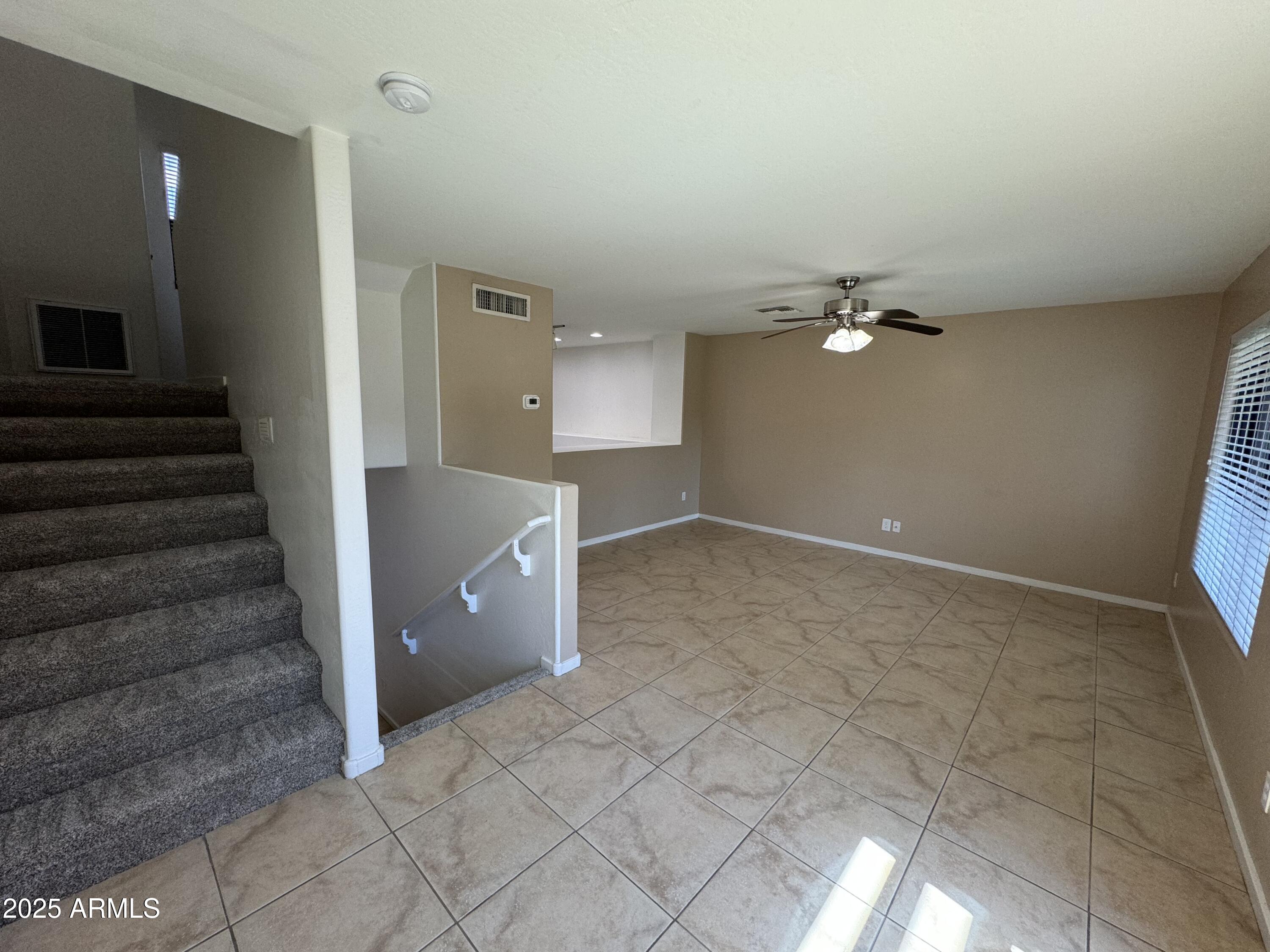 305 South Wilson Street, Unit 111 Tempe, AZ 85281 - Photo 41 of 48 a view of an empty room with stairs and ventilation