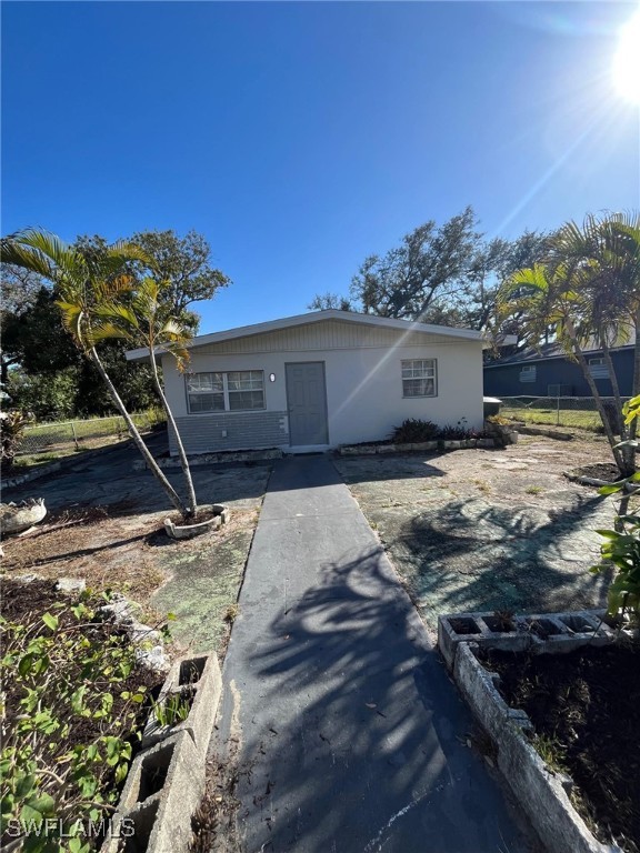 2640-2642 St Charles Street Fort Myers, FL 33916 - Photo 2 of 12 a view of a backyard of the house