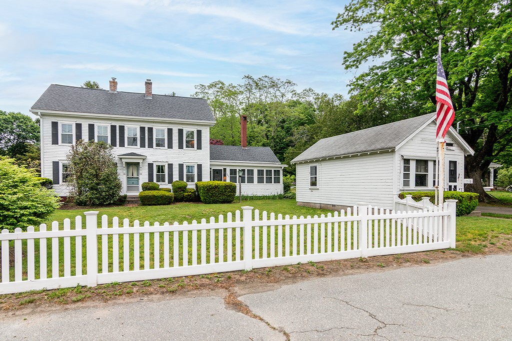 385 Ten Rod Road North Kingstown, RI 02852 - Photo 1 of 36 Complete with white picket fence, this 2 family with small commercial building (for years a barber shop)