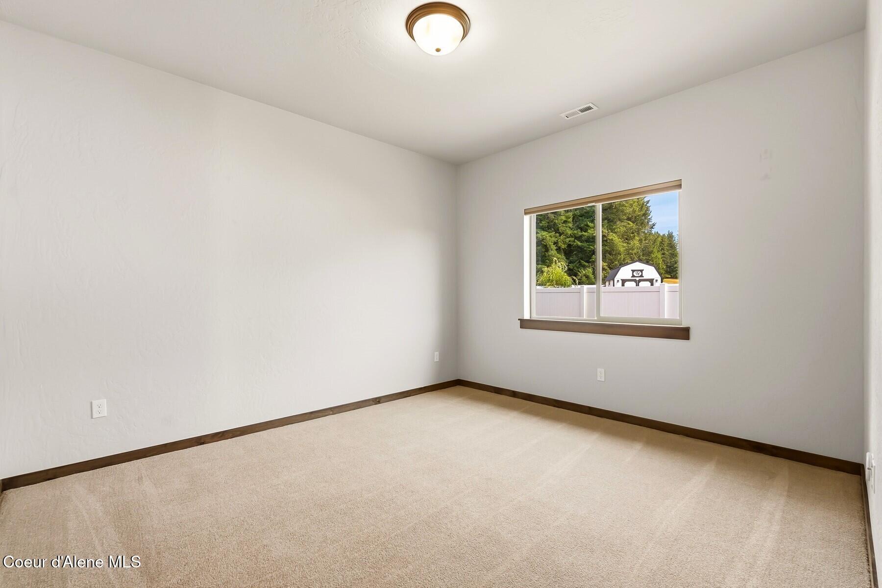 1317 Prominence Court Sandpoint, ID 83864 - Photo 26 of 44 Guest Bedroom #2