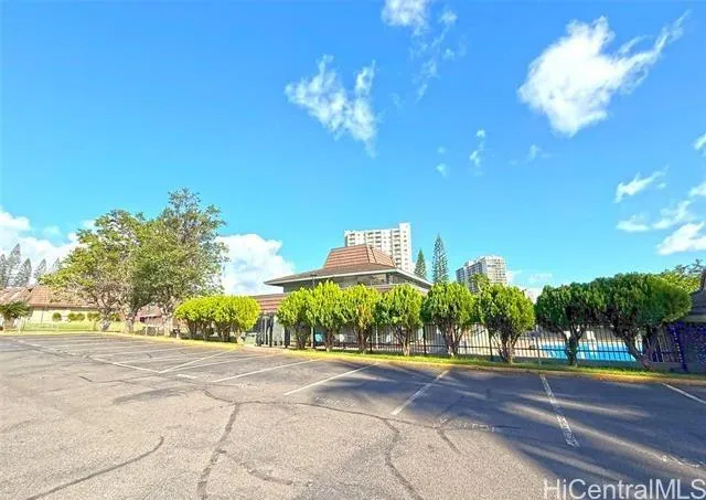 a view of a house with a yard and a garden