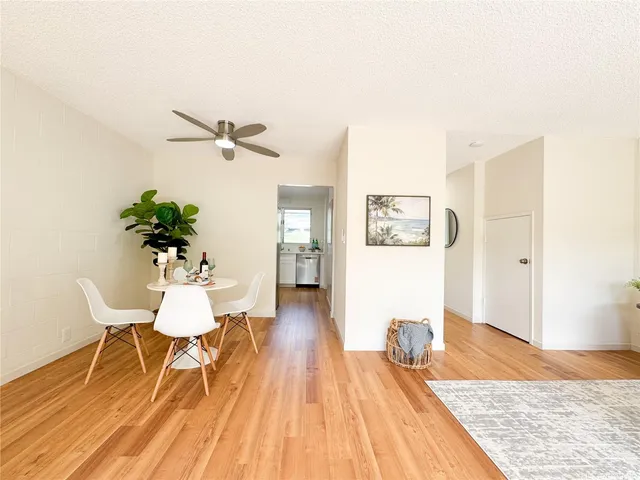 a workspace with furniture and wooden floor