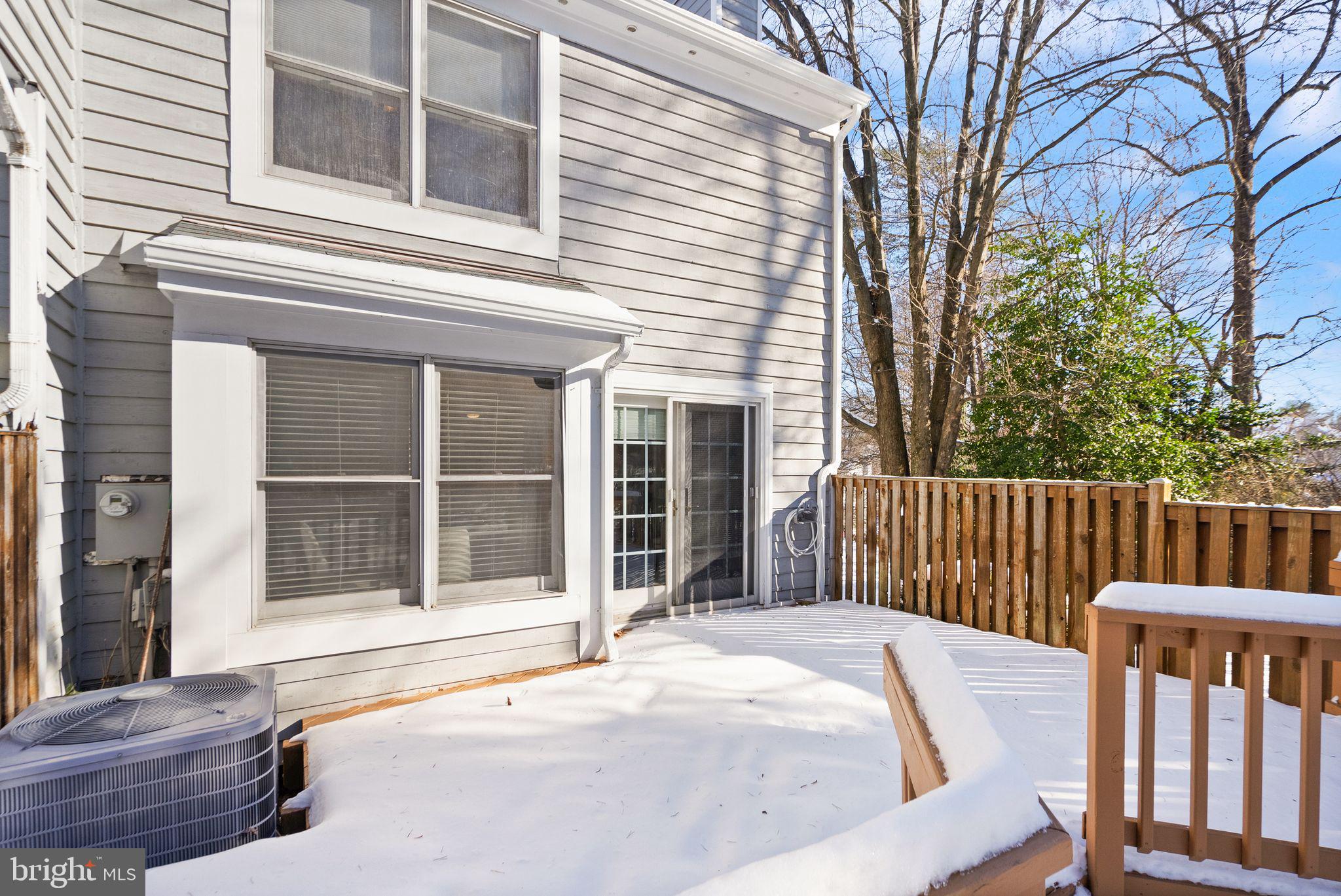 1443 Newport Spring Court Reston, VA 20194 - Photo 50 of 78 Large Back deck with views of trees