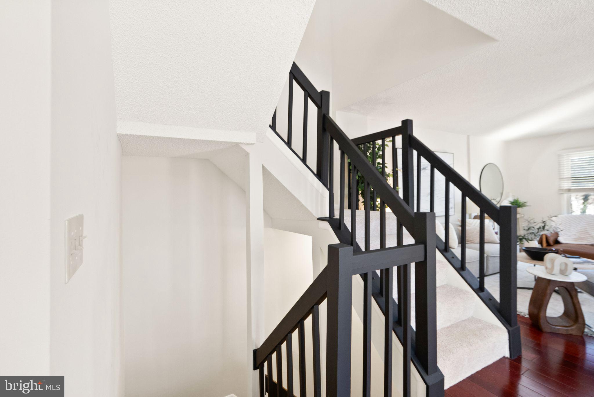1443 Newport Spring Court Reston, VA 20194 - Photo 54 of 78 Updated Black handrails for modern finish