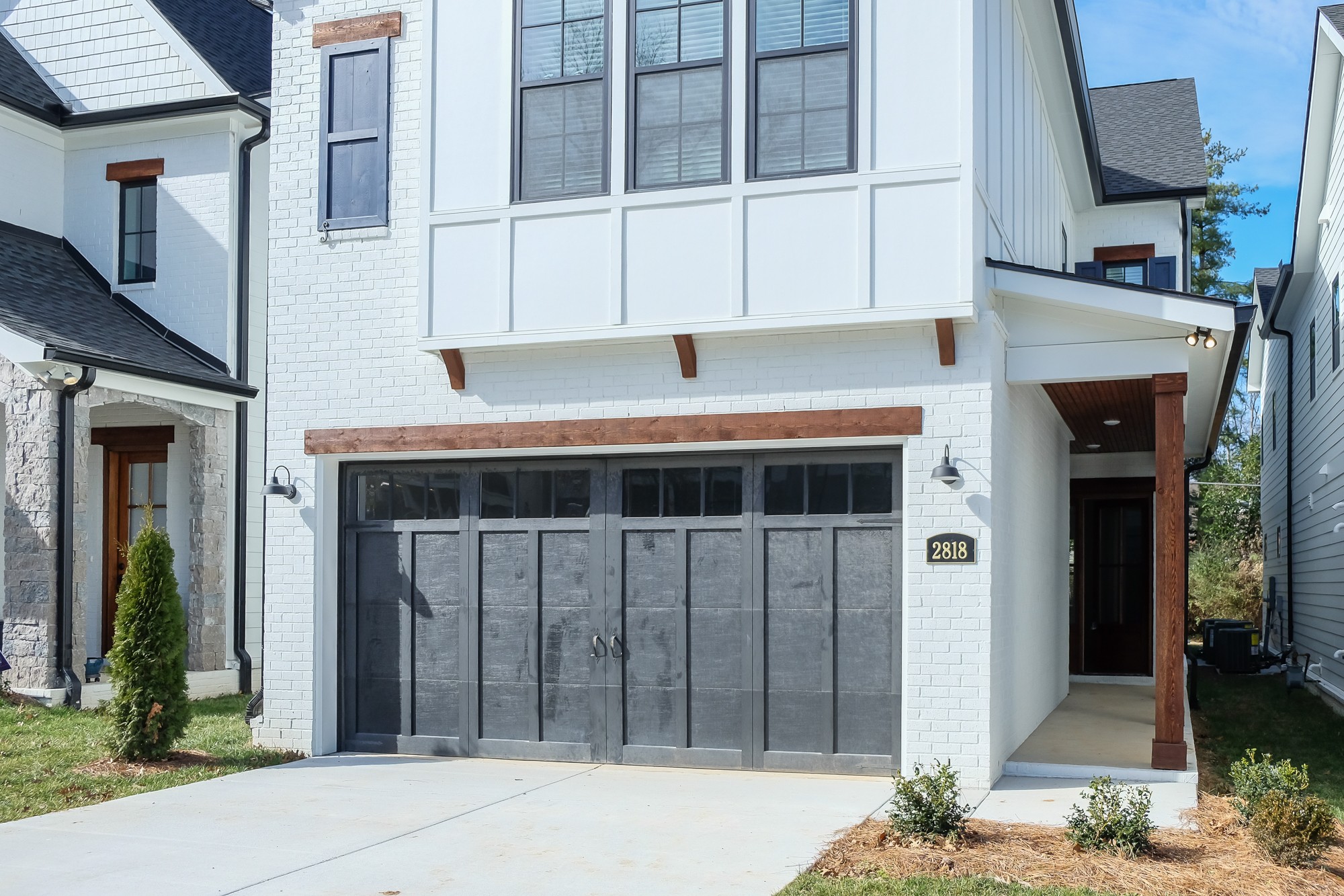 a front view of a house with parking