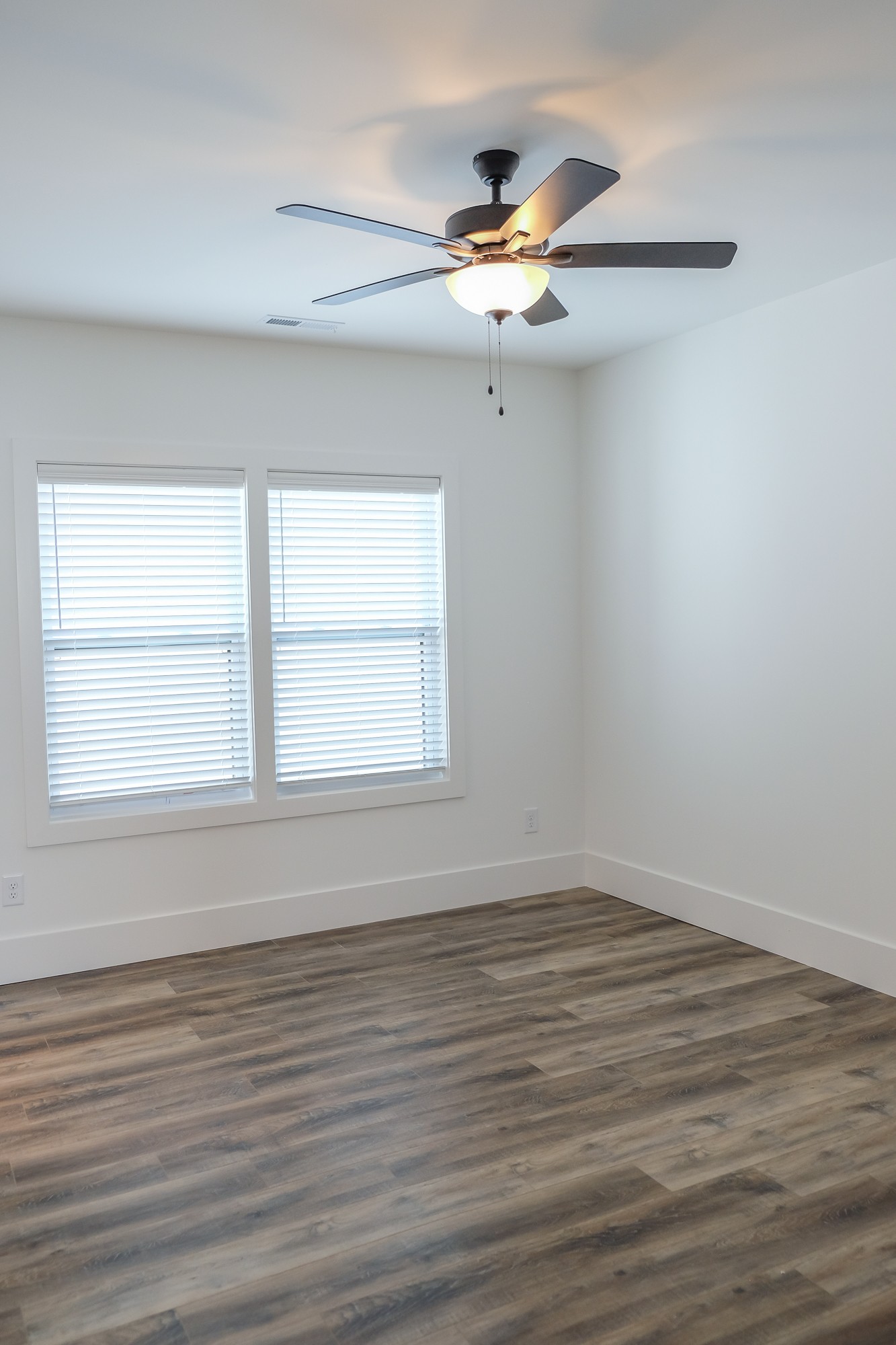 2818 Valley Road Nashville, TN 37215 - Photo 19 of 21 wooden floor in an empty room with a window
