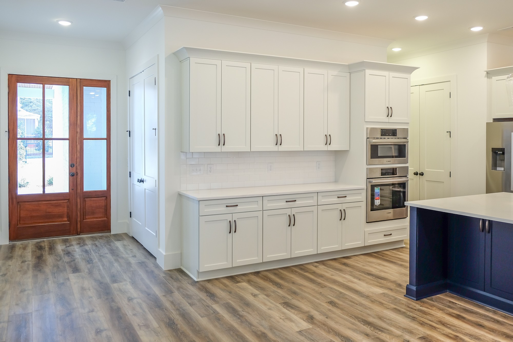 2818 Valley Road Nashville, TN 37215 - Photo 2 of 21 a kitchen with stainless steel appliances granite countertop a stove a sink and white cabinets