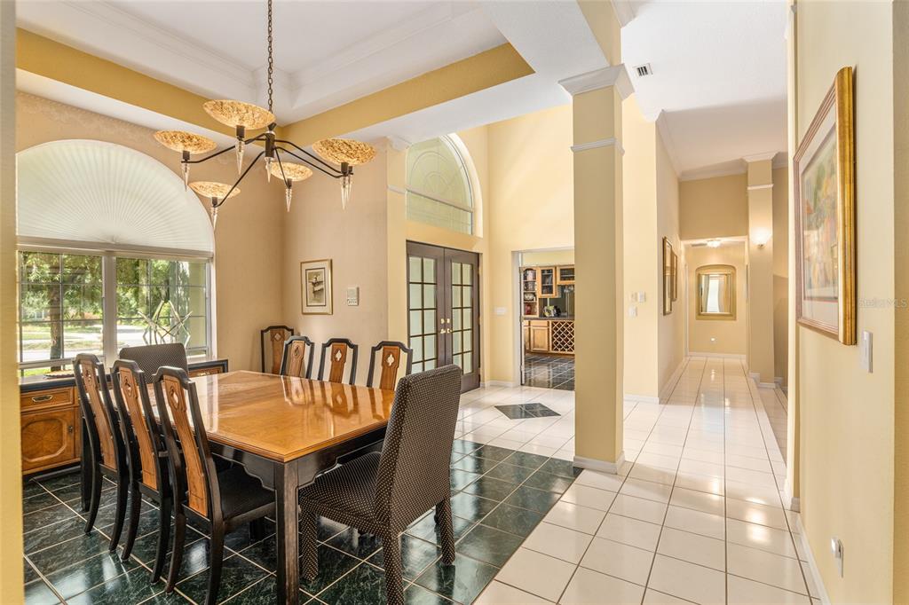 2215 Spring Hill Court Ocala, FL 34471 - Photo 14 of 62 a view of a a dining room with furniture window and wooden floor