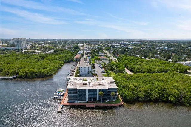 a view of a garden with houses