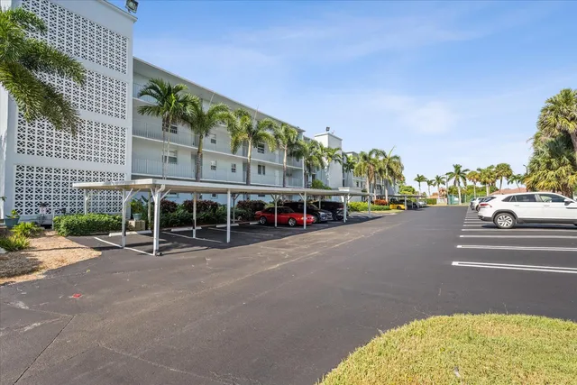 a view of a street with cars