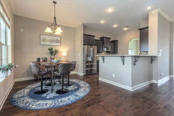 a view of a dining room with furniture