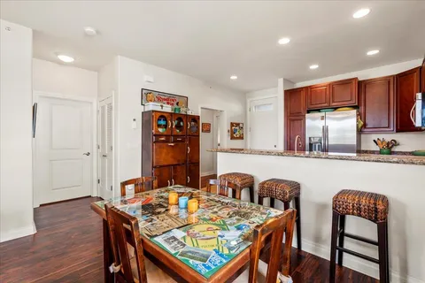 a view of a dining room with furniture