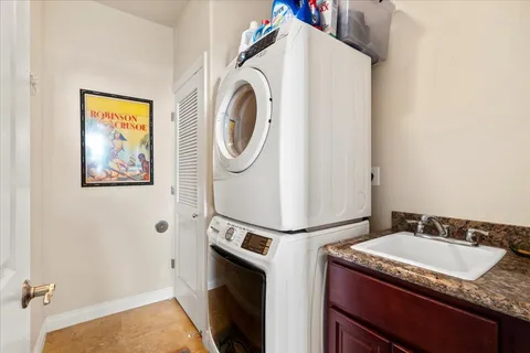a utility room with dryer and washer