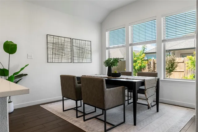 a dining room with a window