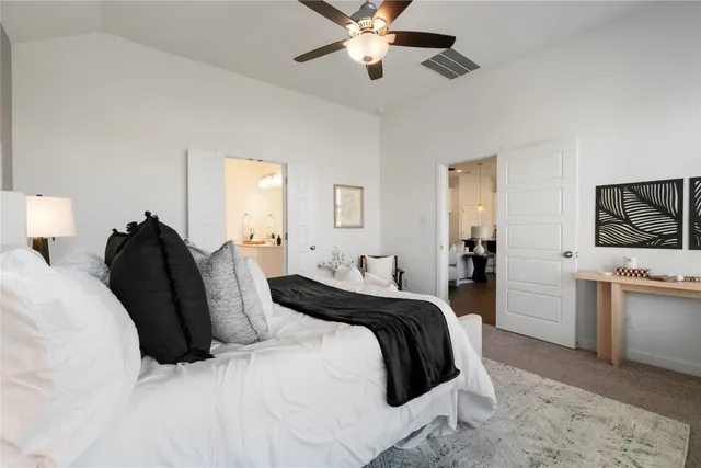 a bathroom with a double vanity sink mirror and shower