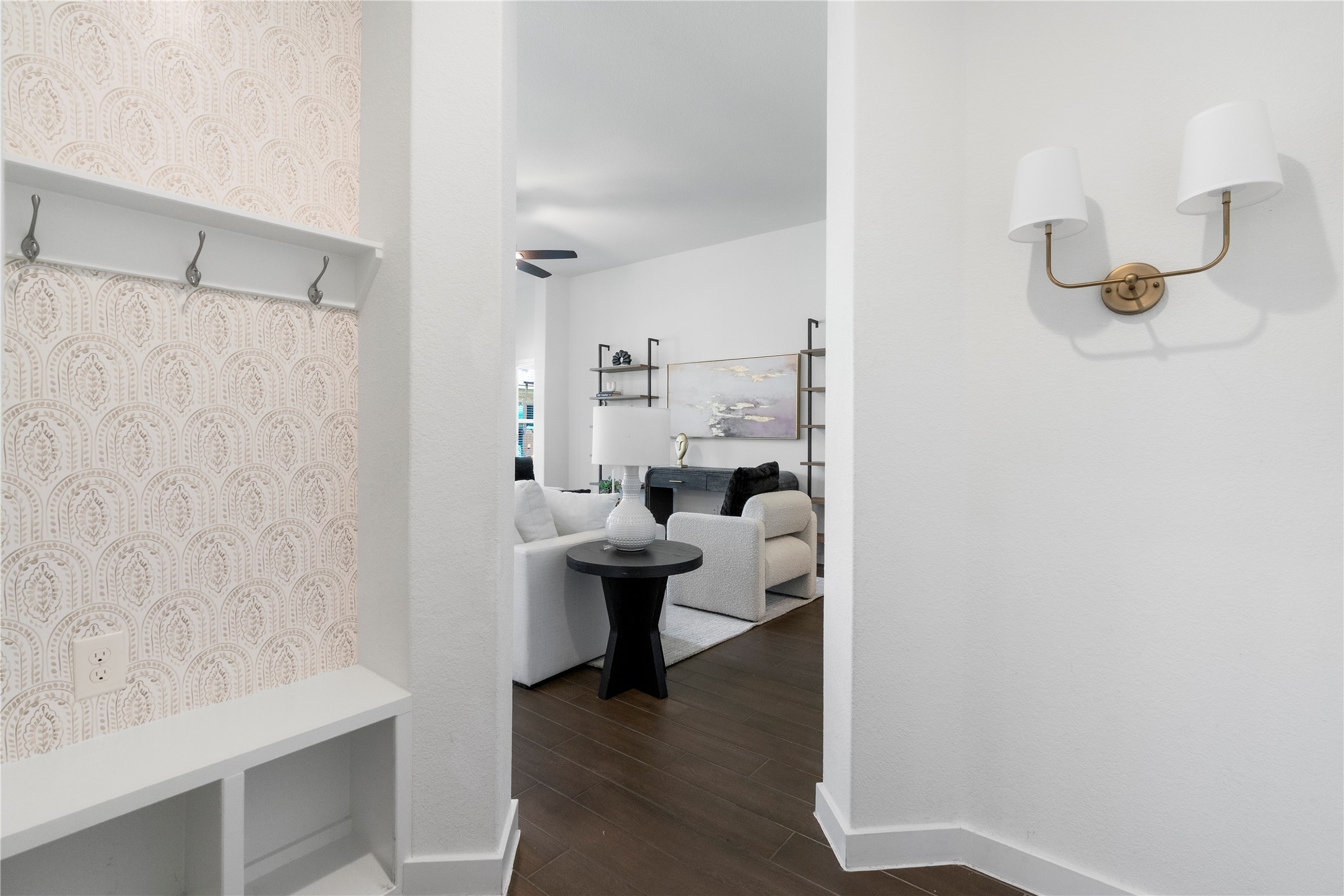 2021 Josiah Cove Leander, TX 78641 - Photo 26 of 35 Mudroom featuring dark wood-style floors and wallpapered walls