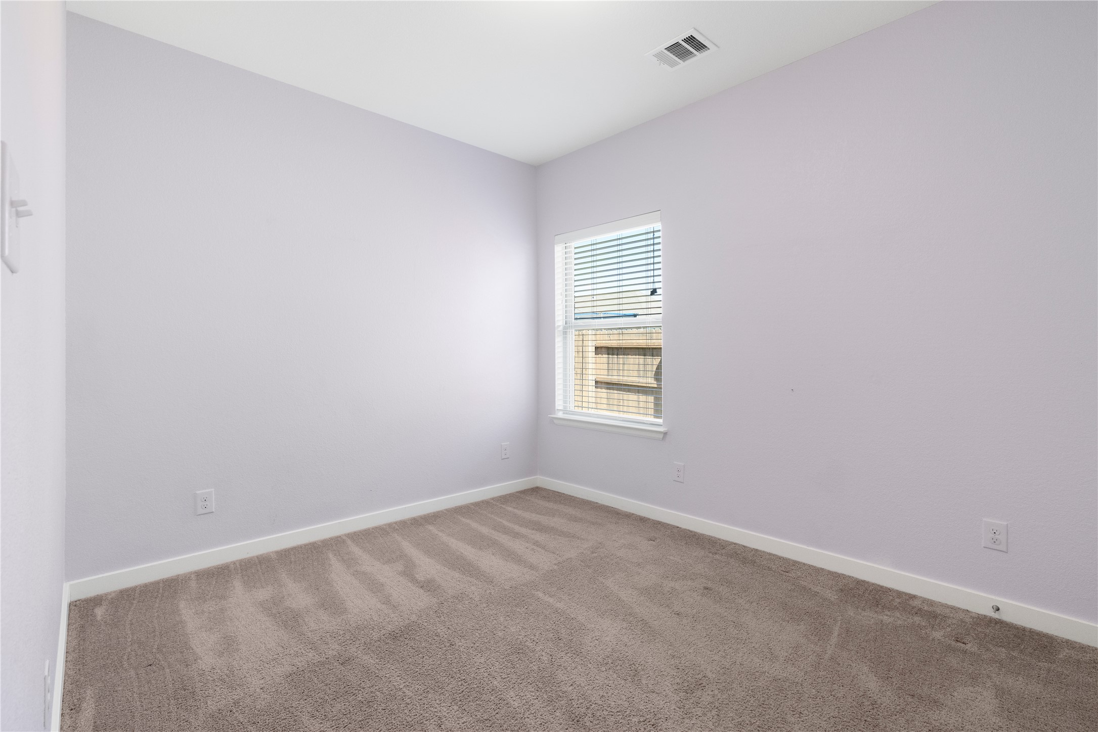 2021 Josiah Cove Leander, TX 78641 - Photo 27 of 35 Carpeted spare room with baseboards