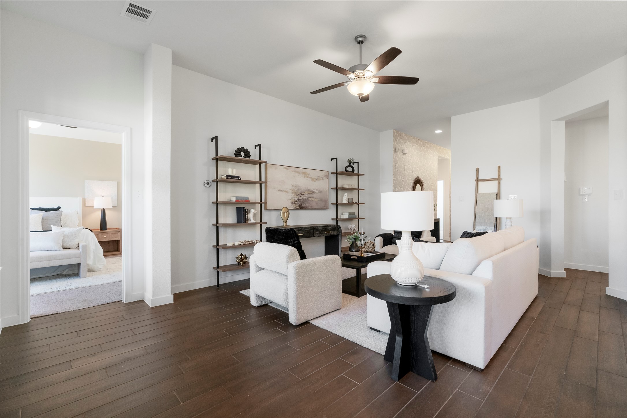 2021 Josiah Cove Leander, TX 78641 - Photo 8 of 35 Living room with wood tiled floors and ceiling fan