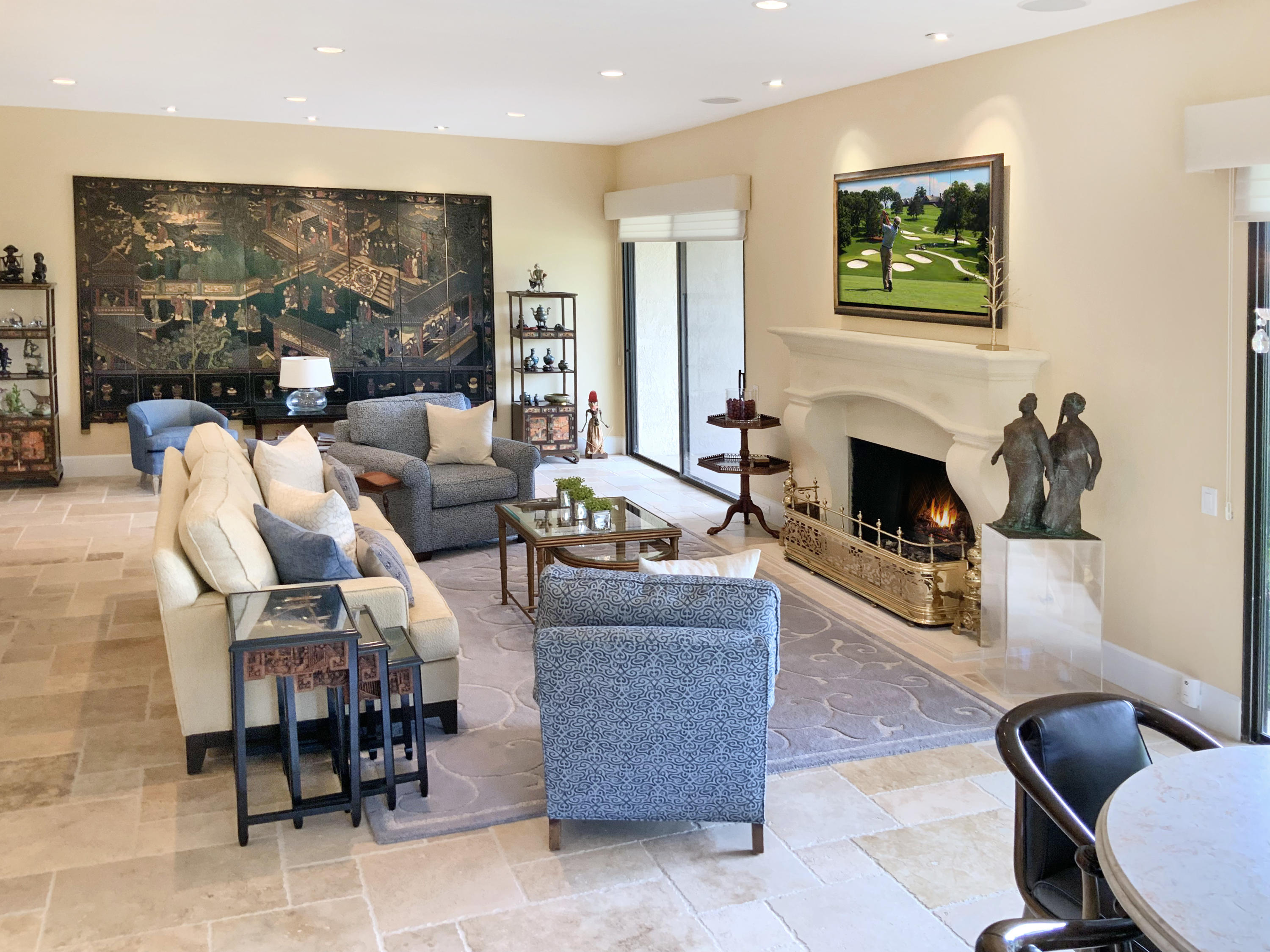 7 Princeton Drive Rancho Mirage, CA 92270 - Photo 2 of 39 a living room with furniture and a fireplace