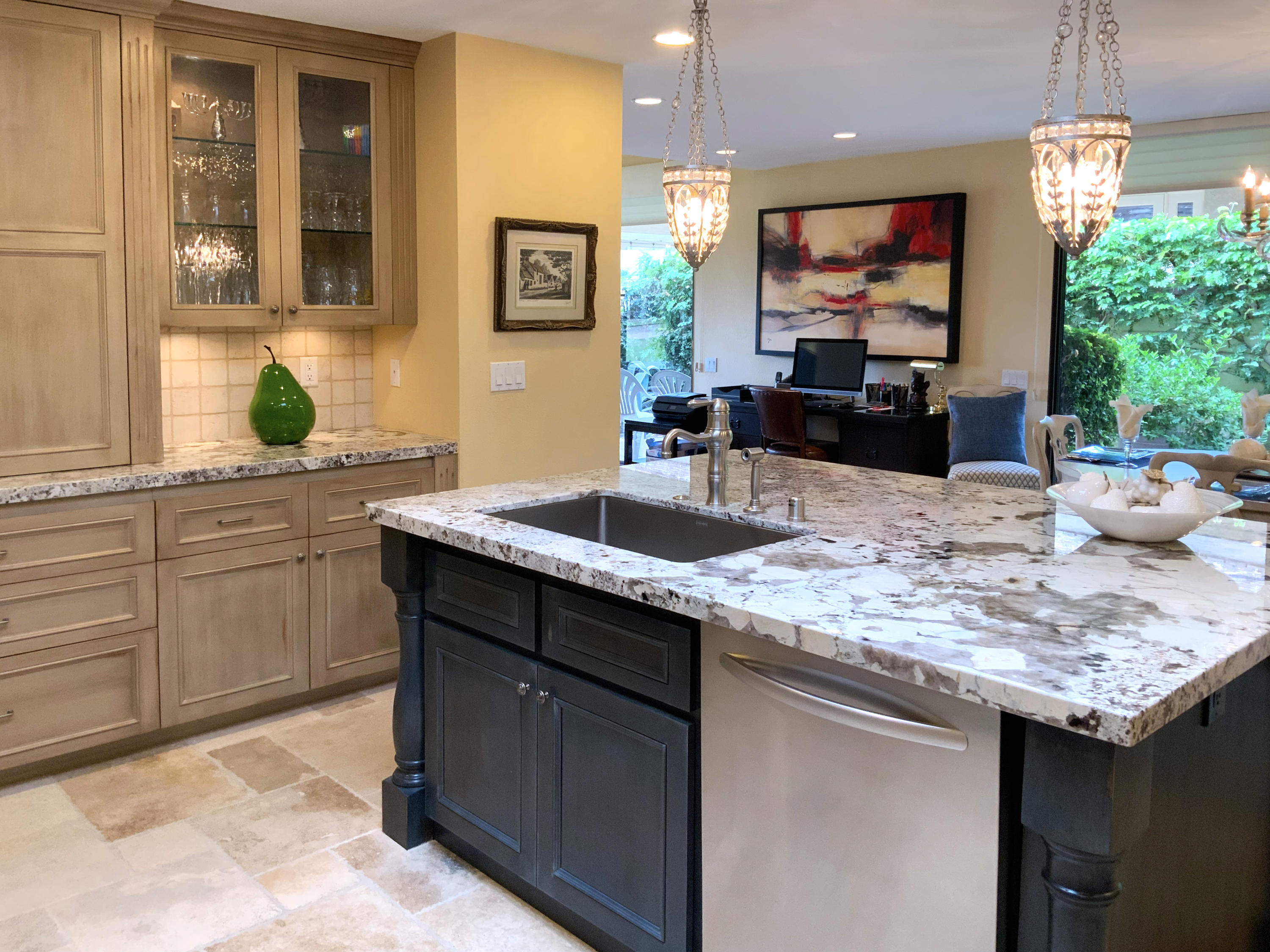 7 Princeton Drive Rancho Mirage, CA 92270 - Photo 17 of 39 a kitchen with kitchen island granite countertop a sink and a stove top oven