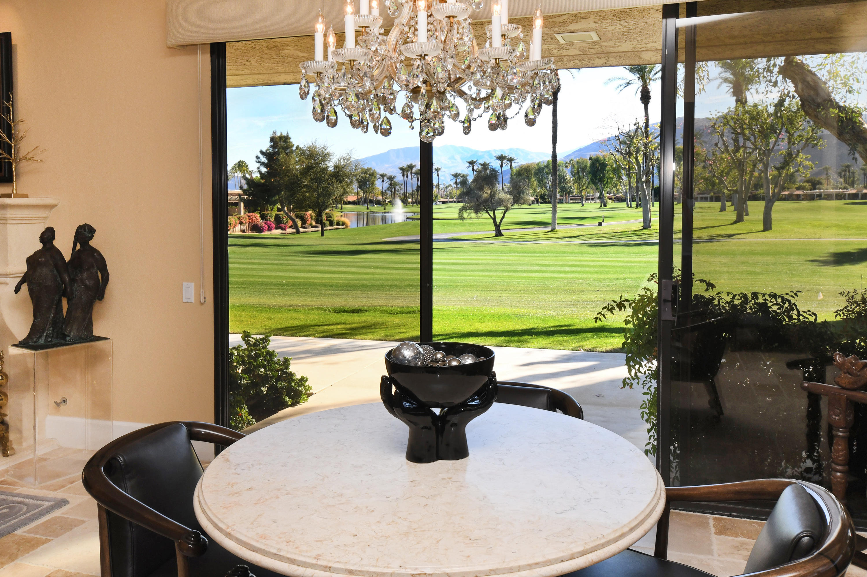 7 Princeton Drive Rancho Mirage, CA 92270 - Photo 4 of 39 a dining room with furniture and garden view