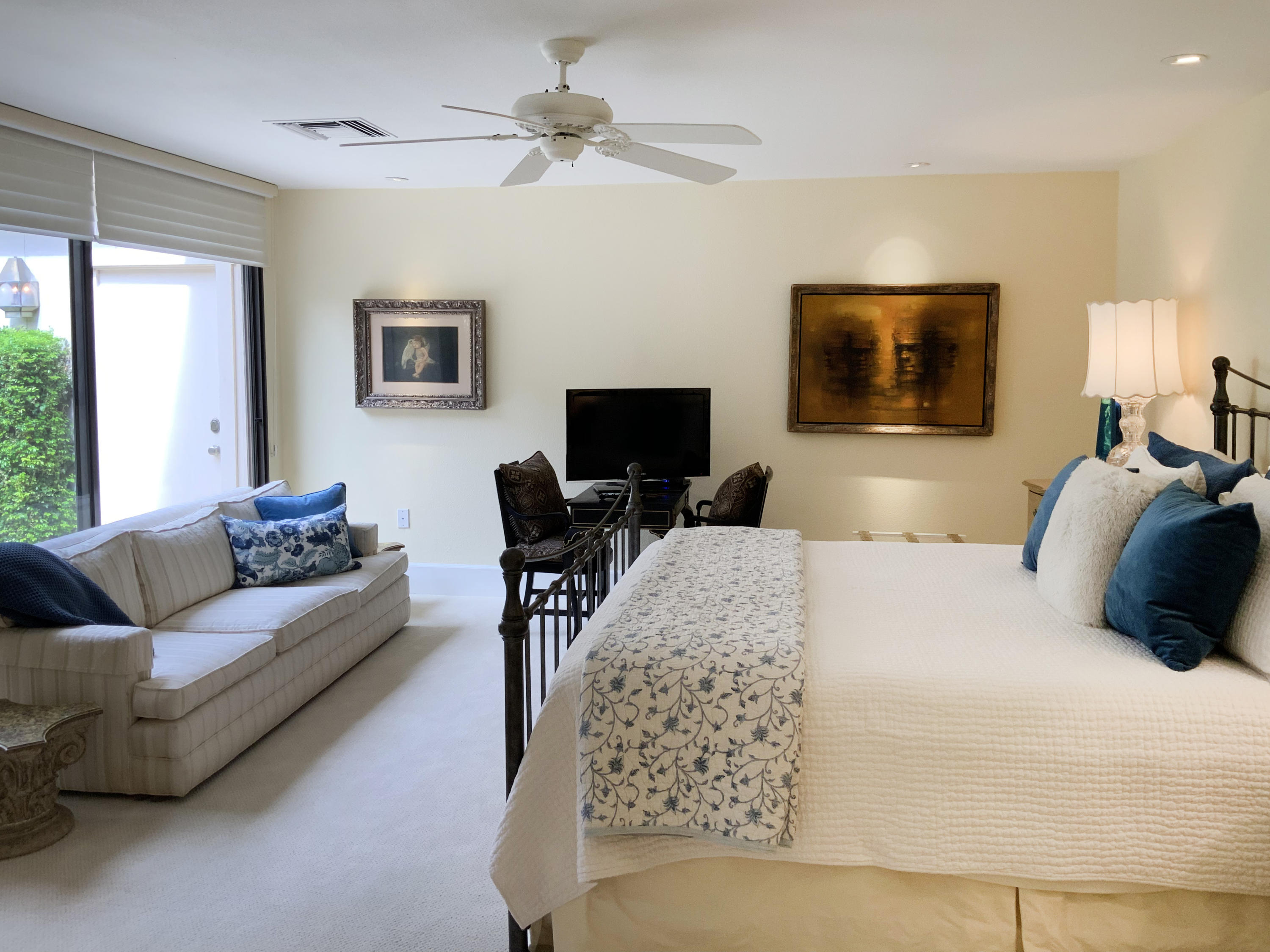 7 Princeton Drive Rancho Mirage, CA 92270 - Photo 33 of 39 a living room with furniture and a flat screen tv