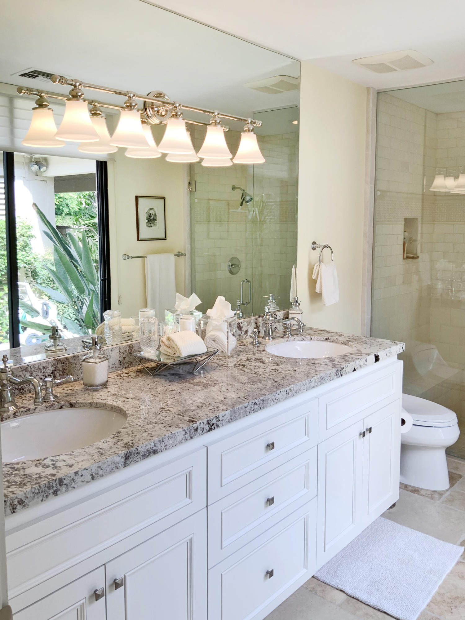 7 Princeton Drive Rancho Mirage, CA 92270 - Photo 34 of 39 a bathroom with a granite countertop sink mirror and a toilet