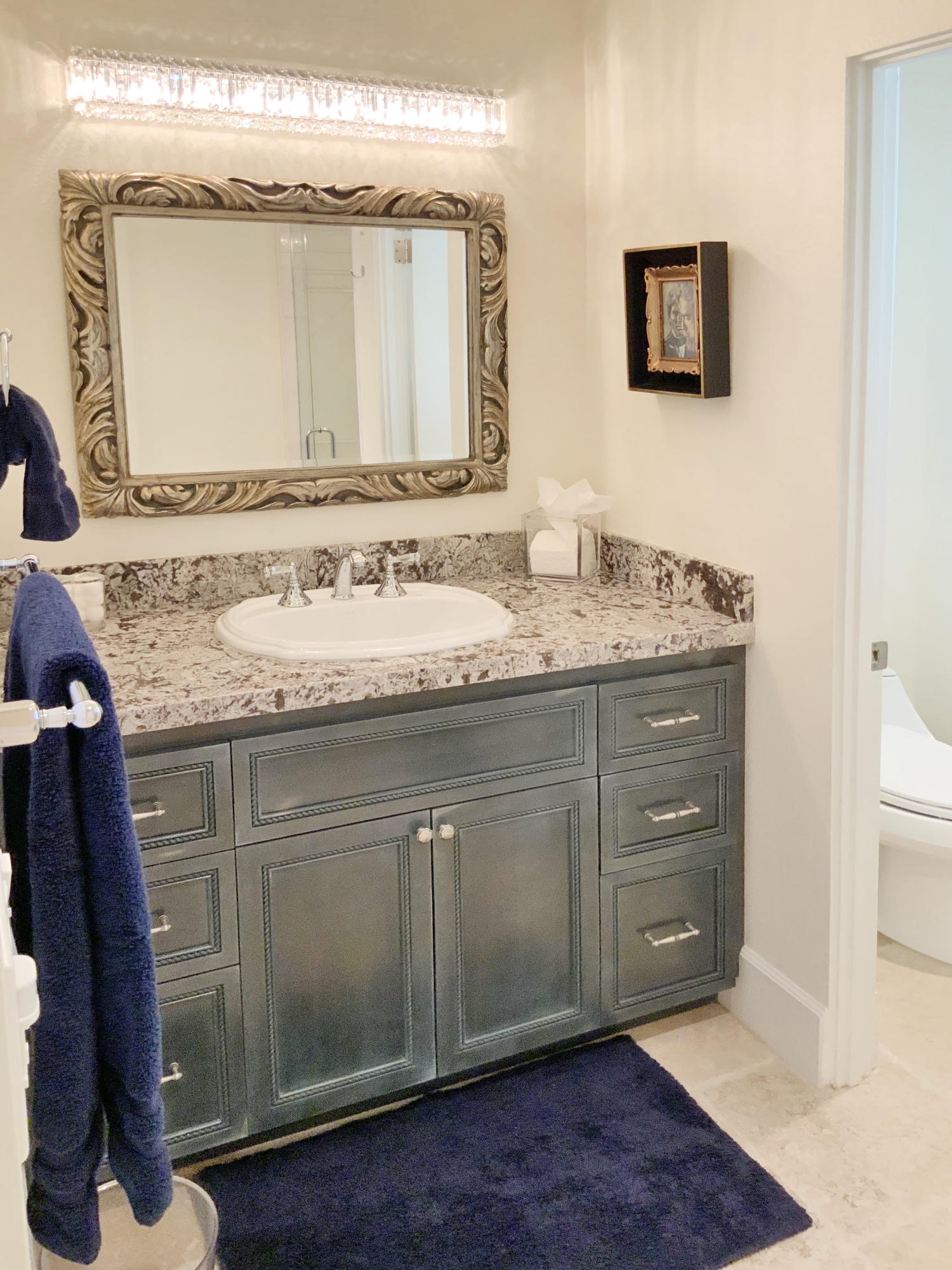 7 Princeton Drive Rancho Mirage, CA 92270 - Photo 38 of 39 a bathroom with a sink and a mirror