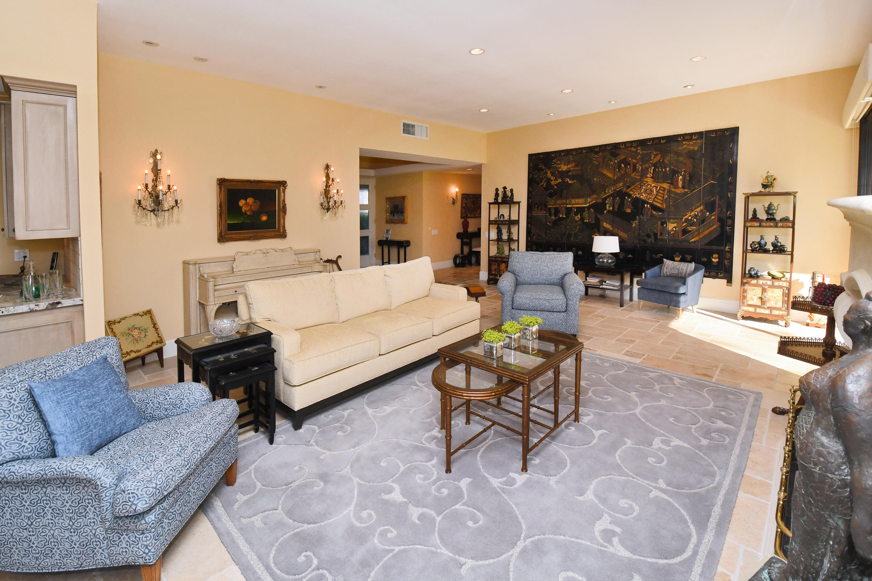 7 Princeton Drive Rancho Mirage, CA 92270 - Photo 8 of 39 a living room with furniture and glass wall