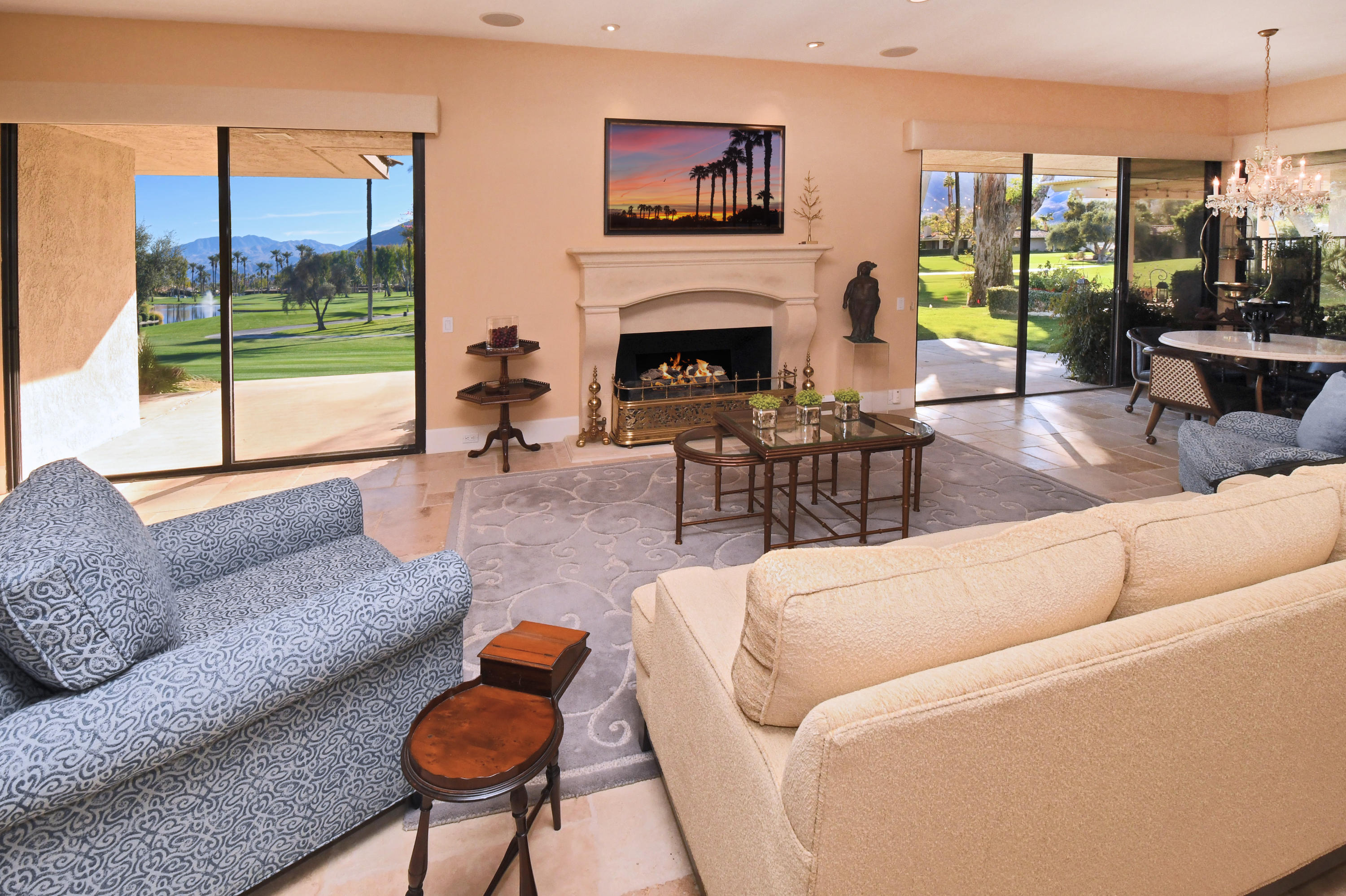 7 Princeton Drive Rancho Mirage, CA 92270 - Photo 9 of 39 a living room with furniture and a fireplace
