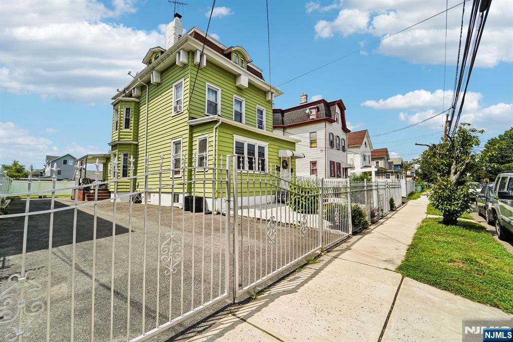 514 Madison Avenue Elizabeth, NJ 07201 - Photo 4 of 14 a view of a balcony with a floor to ceiling window