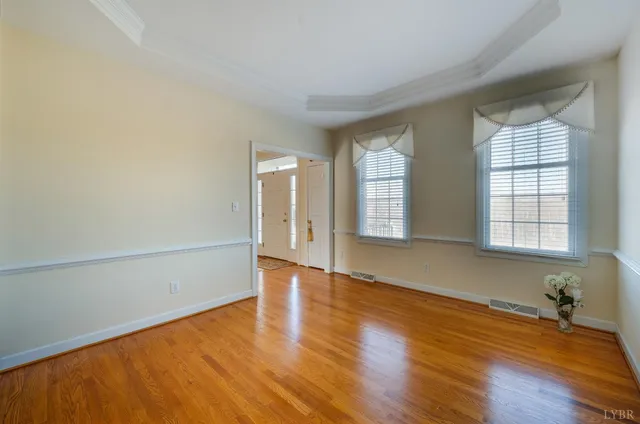 a kitchen with stainless steel appliances granite countertop a refrigerator stove and a sink