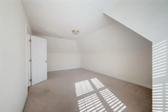 a view of storage and utility room with washer and dryer