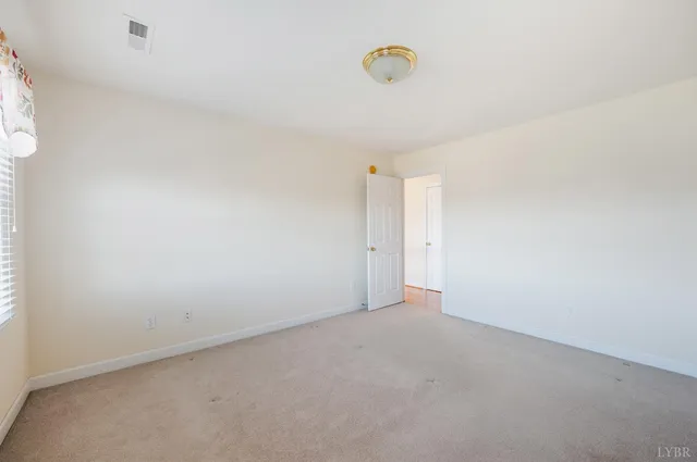 a black and white photo of a living room