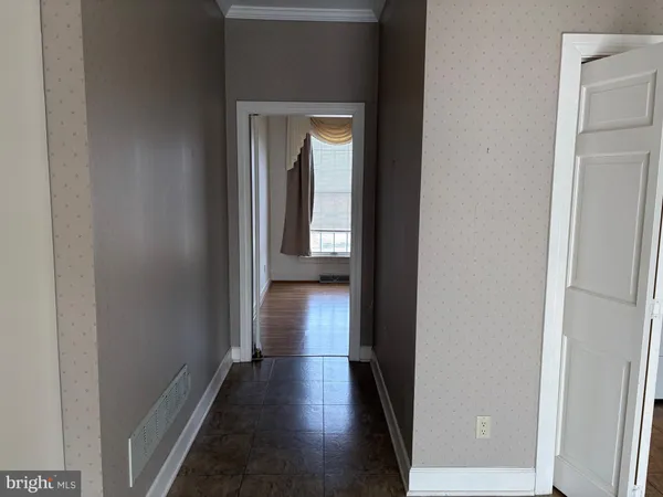 a view of a hallway from a hallway