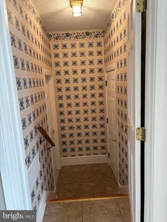 a bathroom with a shower curtain