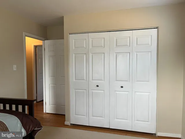 a view of a livingroom with wooden floor