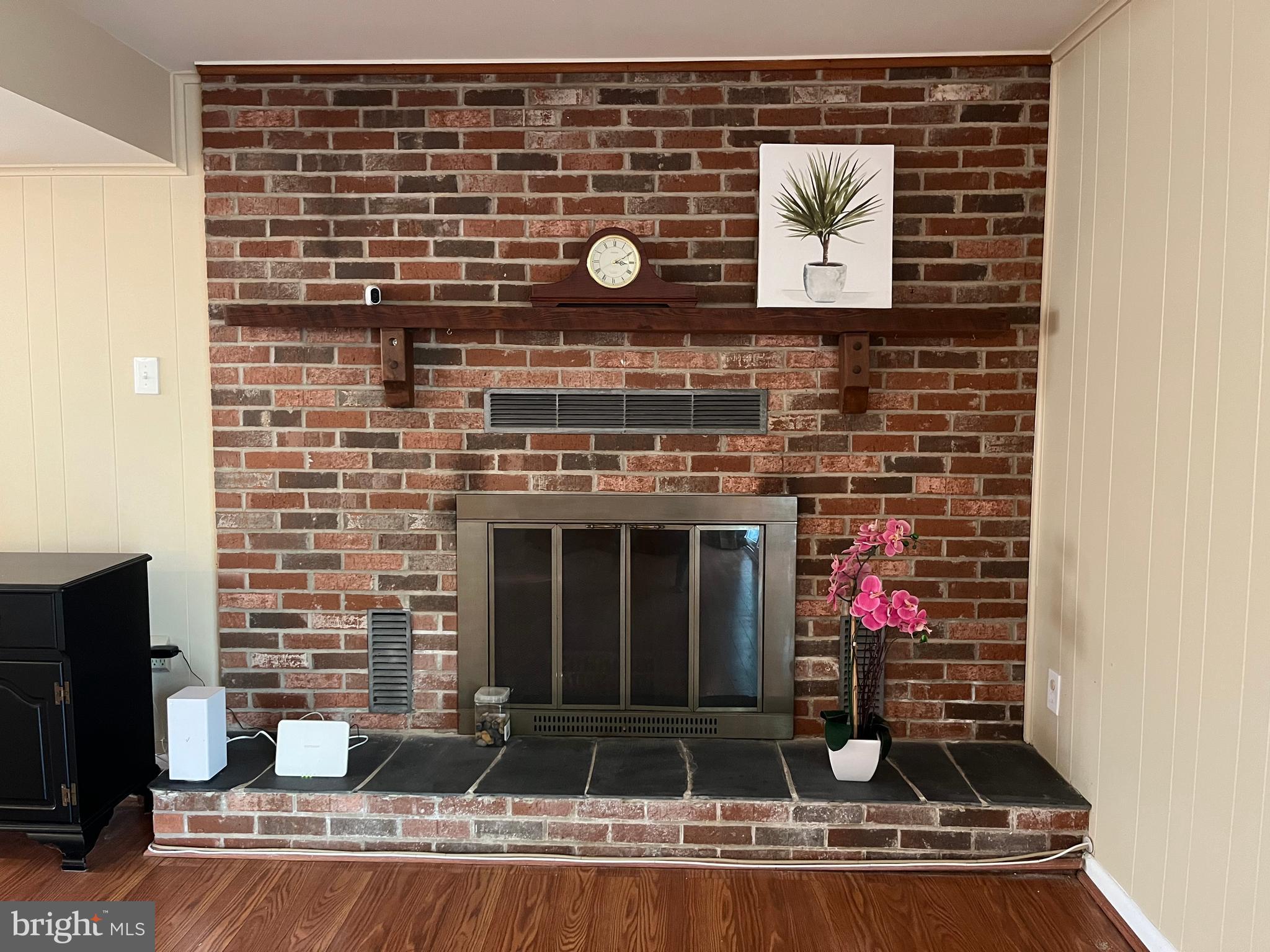 7018 Redmiles Road Laurel, MD 20707 - Photo 26 of 39 a living room with a fireplace