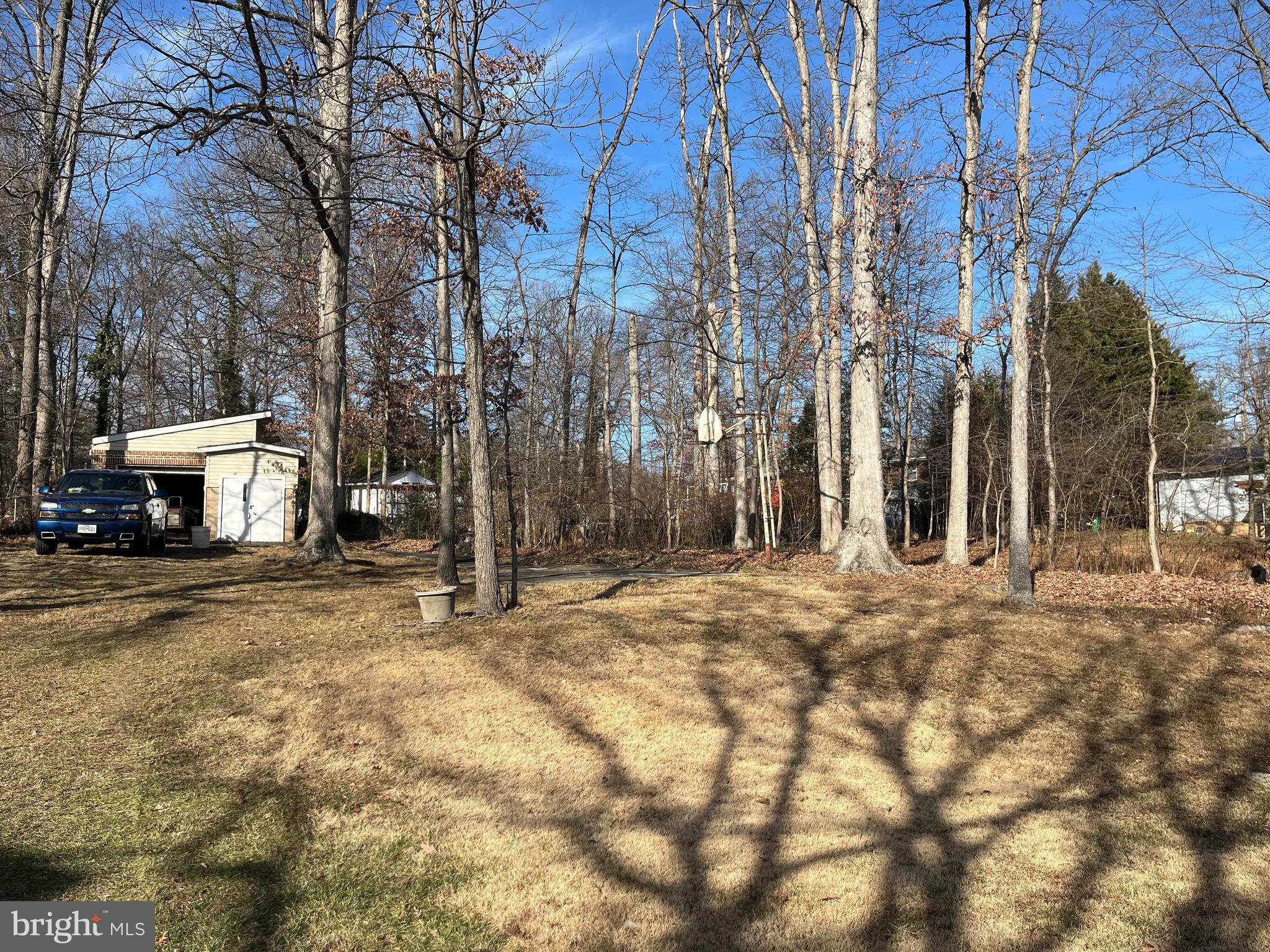 7018 Redmiles Road Laurel, MD 20707 - Photo 38 of 39 a big house with trees in front of it