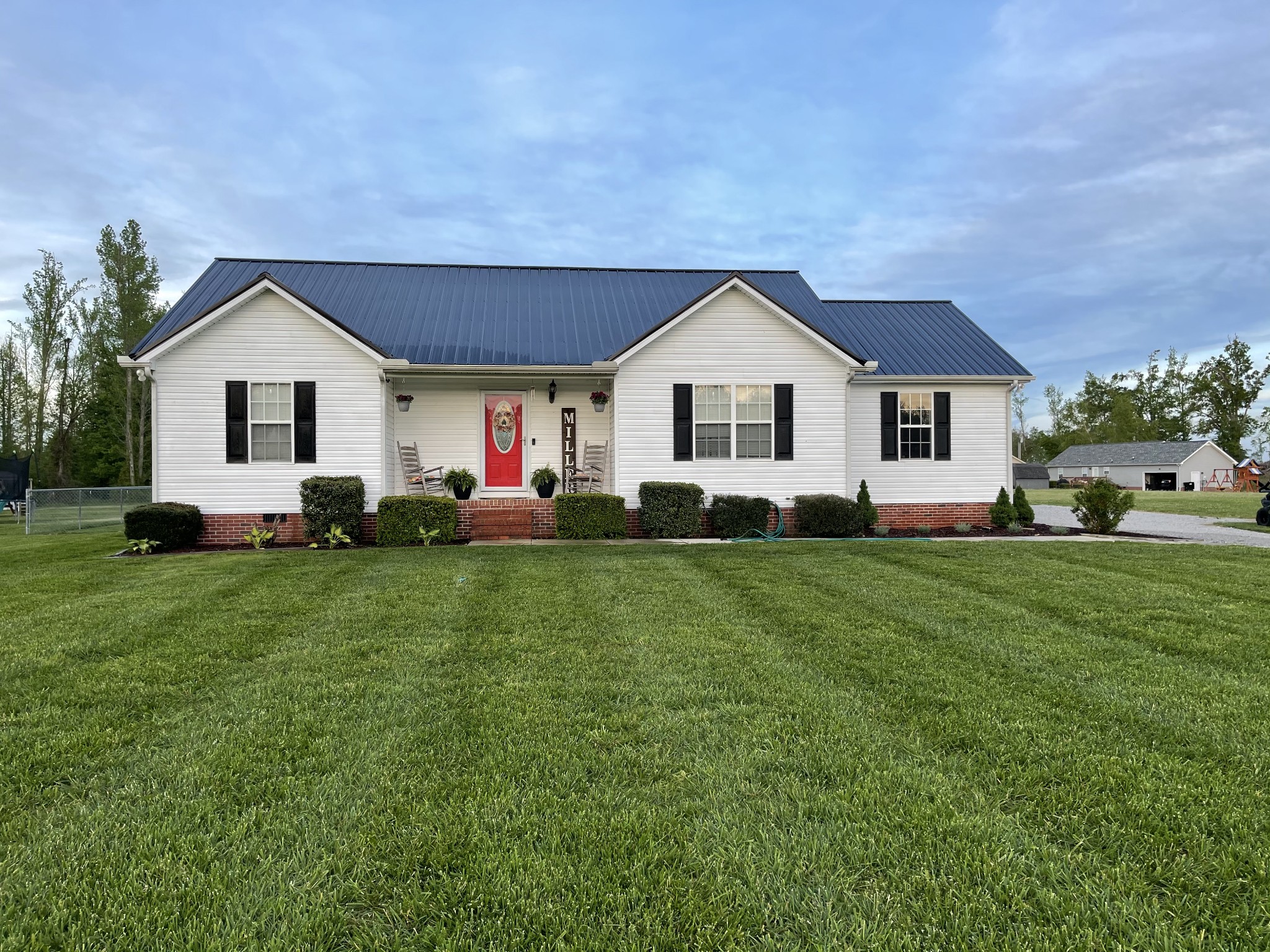 72 Ferrells Loop Road Manchester, TN 37355 - Photo 1 of 11 a front view of house with yard and green space